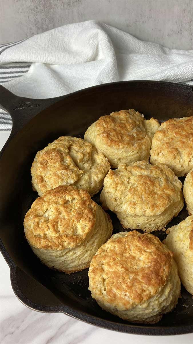 homemade buttery buttermilk biscuits from scratch in a cast iron skillet