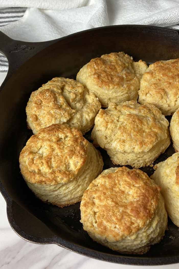 homemade buttery buttermilk biscuits from scratch in a cast iron skillet