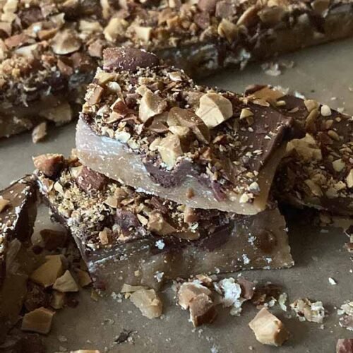 stack of easy homemade english toffee coated with chocolate and almonds