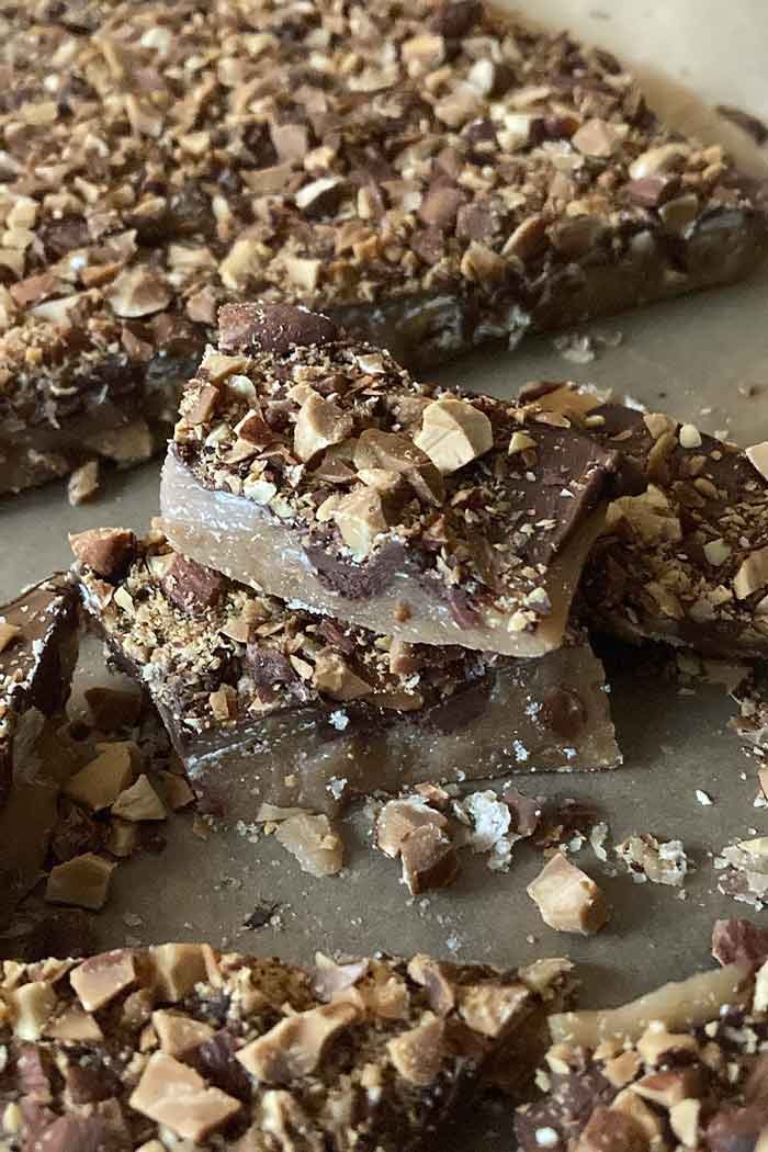 stack of easy homemade english toffee coated with chocolate and almonds