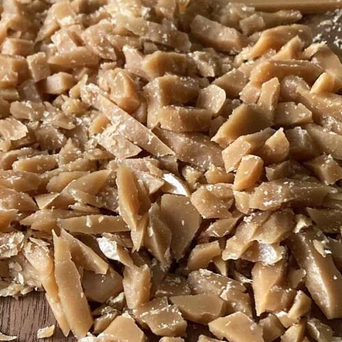 easy-to-make toffee bits on a wooden cutting board
