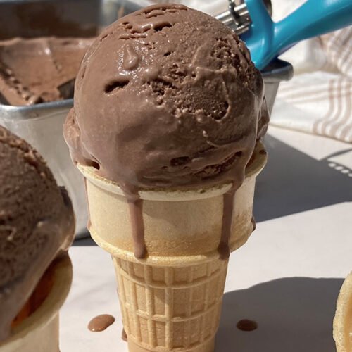homemade chocolate malt ice cream melting in a cone