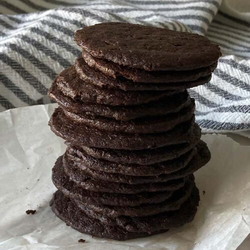 stack of thin and crispy chocolate wafer cookies
