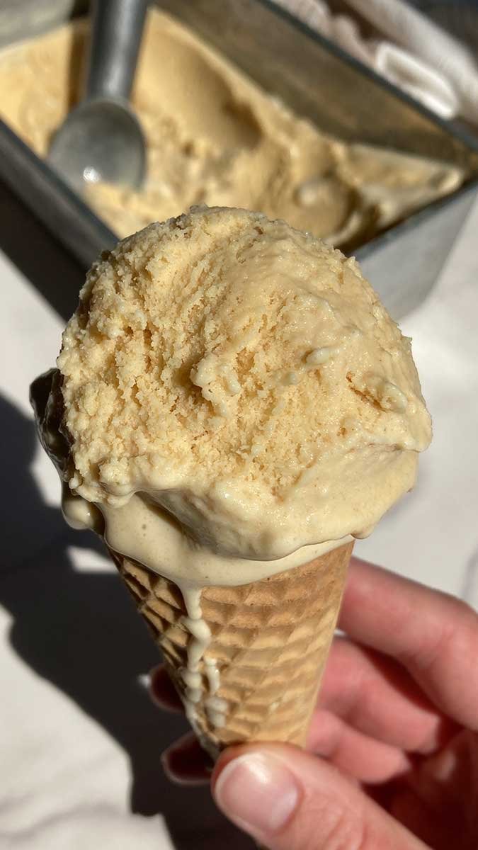 scoop of homemade brown butter ice cream in a cone