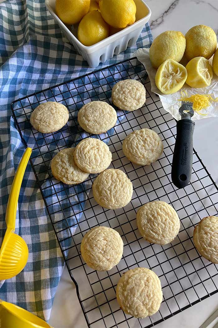 plain homemade lemon cookies cooling on a rack