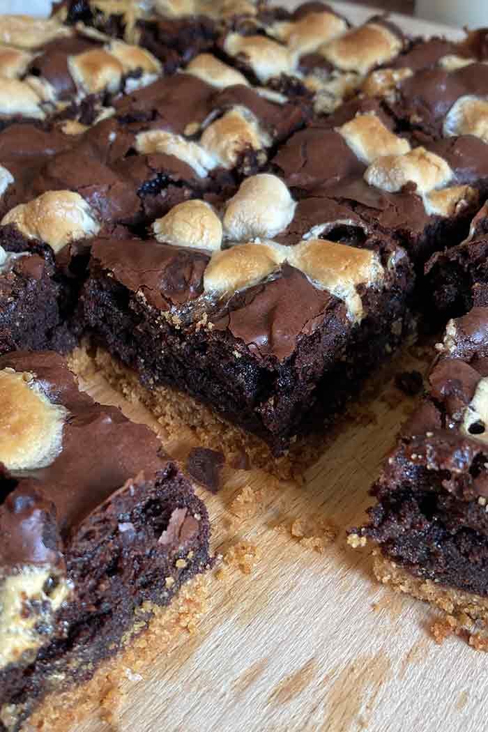s'mores brownies with graham cracker crust and toasted marshmallows