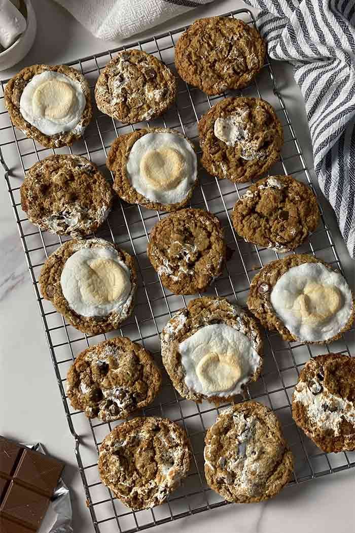homemade s'mores cookies with marshmallow on a cooling rack